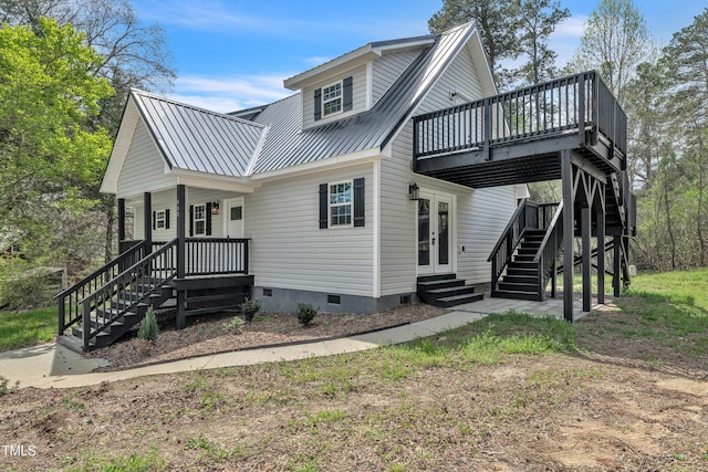 852 Fred Wilder Rd, Franklinton, NC 27525 - view of front of home featuring stairs, crawl space, french doors, metal roof, and a deck