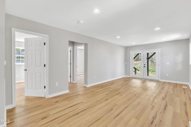 852 Fred Wilder Rd, Franklinton, NC 27525 - spare room with french doors, light wood-style flooring, healthy amount of natural light, and recessed lighting