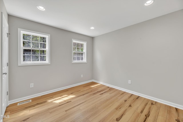 852 Fred Wilder Rd, Franklinton, NC 27525 - unfurnished room with baseboards, light wood finished floors, and recessed lighting