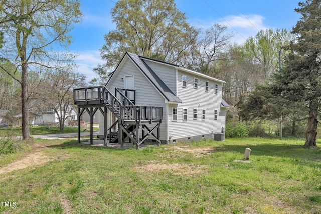 852 Fred Wilder Rd, Franklinton, NC 27525 - view of property exterior featuring a deck, crawl space, stairway, a lawn, and metal roof