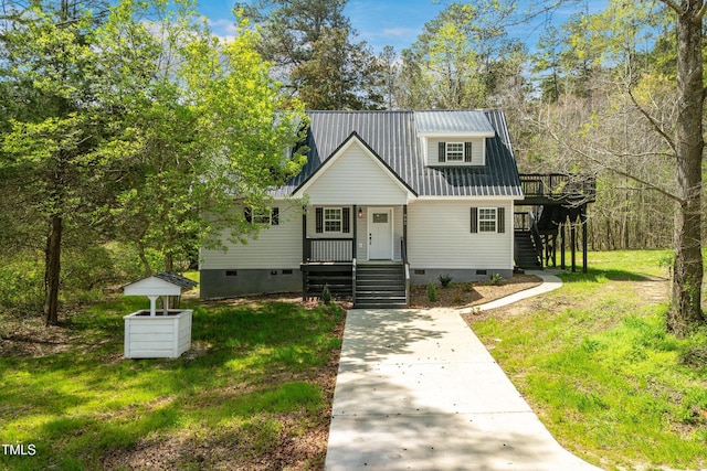 852 Fred Wilder Rd, Franklinton, NC 27525 - view of front of property featuring crawl space, stairway, metal roof, a front lawn, and a porch