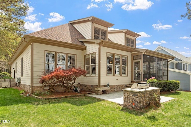 1525 Marshall Farm St, Wake Forest, NC 27587 - back of property with a sunroom, a shingled roof, a yard, and a patio area