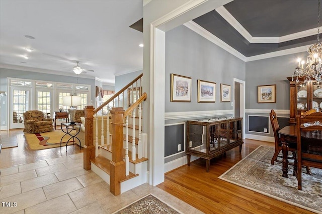1525 Marshall Farm St, Wake Forest, NC 27587 - dining space featuring stairway, wood finished floors, baseboards, ceiling fan with notable chandelier, and ornamental molding