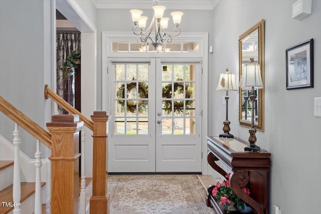 1525 Marshall Farm St, Wake Forest, NC 27587 - entryway with stairs, a notable chandelier, crown molding, and french doors