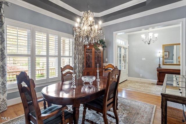 1525 Marshall Farm St, Wake Forest, NC 27587 - dining space with an inviting chandelier, light wood-style flooring, and baseboards