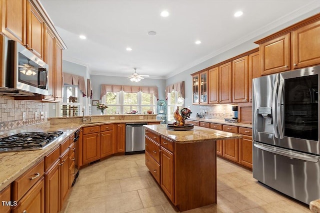 1525 Marshall Farm St, Wake Forest, NC 27587 - kitchen with a sink, stainless steel appliances, and brown cabinets