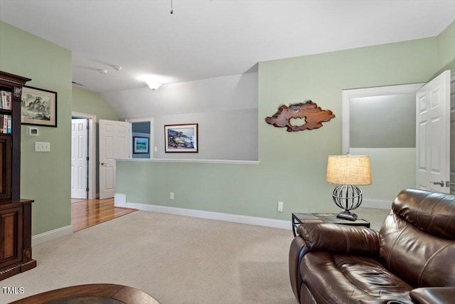 1525 Marshall Farm St, Wake Forest, NC 27587 - carpeted living area featuring baseboards and vaulted ceiling