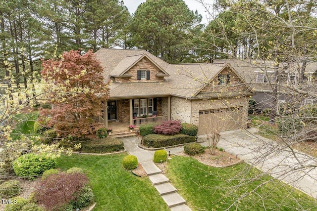 1525 Marshall Farm St, Wake Forest, NC 27587 - view of front of house with driveway, a front yard, covered porch, roof with shingles, and brick siding