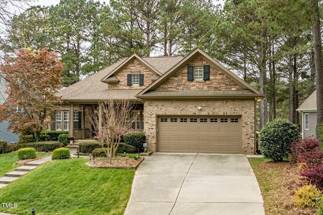 1525 Marshall Farm St, Wake Forest, NC 27587 - craftsman-style house featuring driveway, a front yard, roof with shingles, brick siding, and a garage
