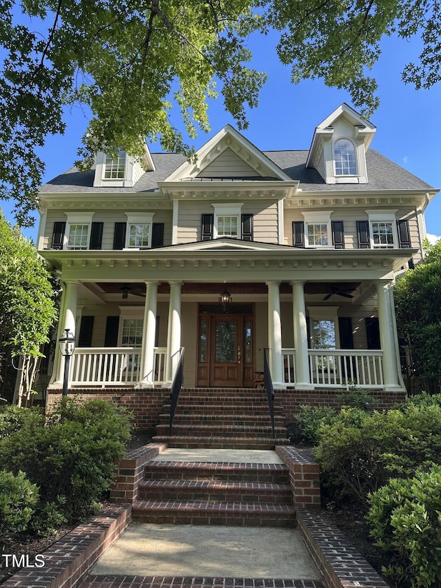 view of front of property with a porch and a ceiling fan