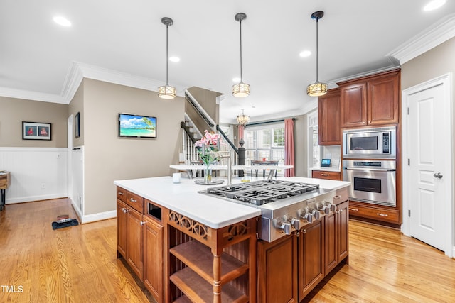 3821 Falls River Ave, Raleigh, NC 27614 - kitchen with stainless steel appliances, crown molding, light wood-type flooring, light countertops, and open shelves