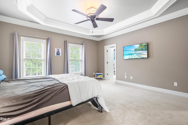 3821 Falls River Ave, Raleigh, NC 27614 - bedroom featuring crown molding, a tray ceiling, carpet floors, ceiling fan, and baseboards