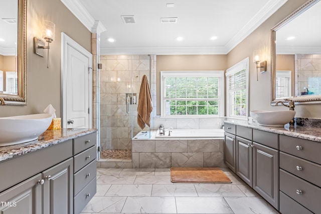 3821 Falls River Ave, Raleigh, NC 27614 - full bath with marble finish floors, a shower stall, a bath, two vanities, and recessed lighting