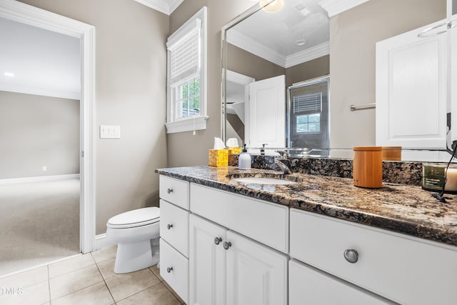 3821 Falls River Ave, Raleigh, NC 27614 - full bath featuring ornamental molding, toilet, vanity, tile patterned floors, and baseboards
