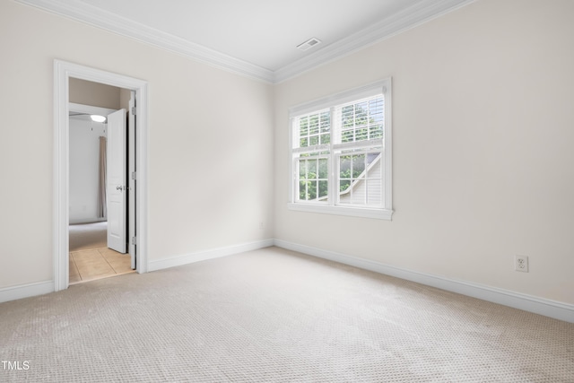 3821 Falls River Ave, Raleigh, NC 27614 - empty room featuring carpet flooring, crown molding, and baseboards