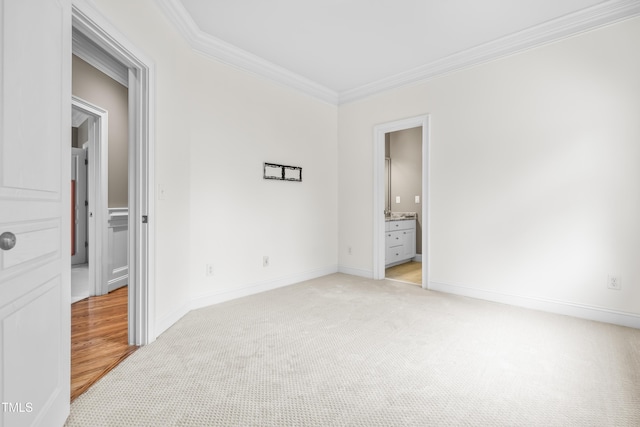 3821 Falls River Ave, Raleigh, NC 27614 - unfurnished bedroom with ornamental molding, light colored carpet, and baseboards
