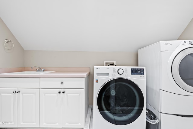 3821 Falls River Ave, Raleigh, NC 27614 - washroom featuring cabinet space and washing machine and clothes dryer
