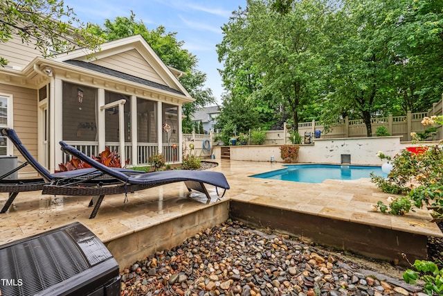 3821 Falls River Ave, Raleigh, NC 27614 - view of pool featuring a sunroom, a fenced backyard, and a patio area