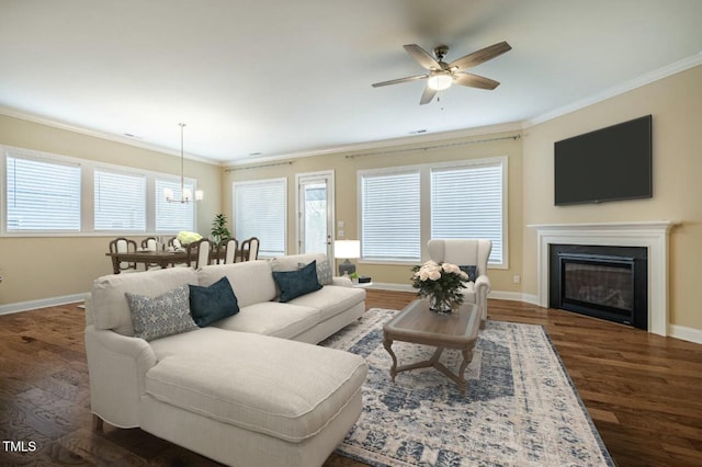 237 Abercorn Cir, Chapel Hill, NC 27516 - living area with crown molding, dark wood-style flooring, baseboards, and a glass covered fireplace