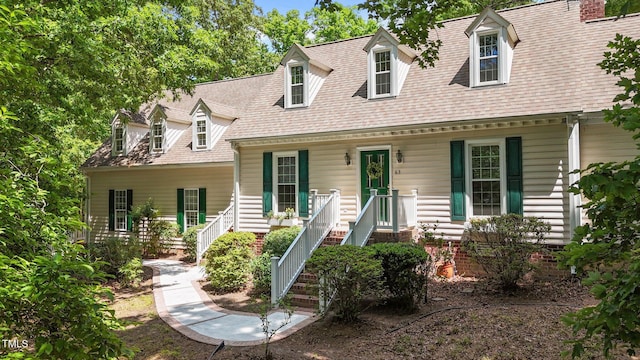 63 Tally Ho Dr, Selma, NC 27576 - cape cod home with covered porch and roof with shingles