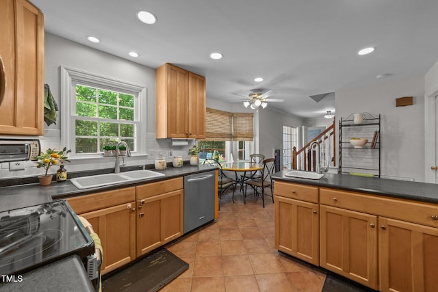 63 Tally Ho Dr, Selma, NC 27576 - kitchen with dishwasher, a sink, range with electric stovetop, recessed lighting, and dark countertops