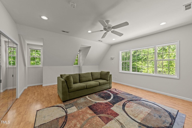 63 Tally Ho Dr, Selma, NC 27576 - living area featuring wood finished floors, baseboards, a ceiling fan, recessed lighting, and vaulted ceiling
