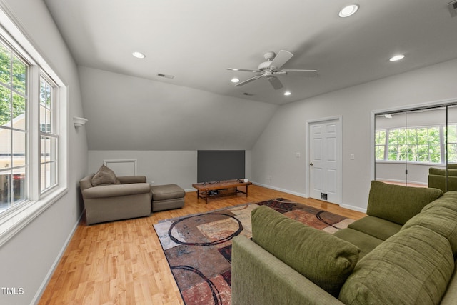 63 Tally Ho Dr, Selma, NC 27576 - living room featuring plenty of natural light, a ceiling fan, baseboards, light wood-style flooring, and lofted ceiling