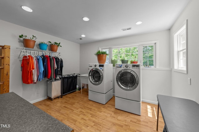63 Tally Ho Dr, Selma, NC 27576 - laundry room with independent washer and dryer, light wood finished floors, recessed lighting, and baseboards