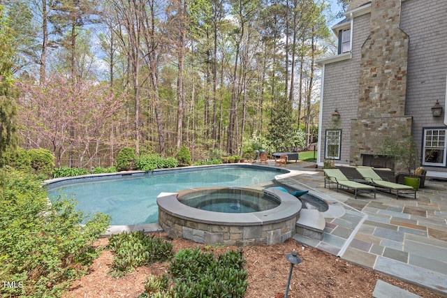 417 Westbury Dr, Chapel Hill, NC 27516 - view of swimming pool with a patio area and a pool with connected hot tub