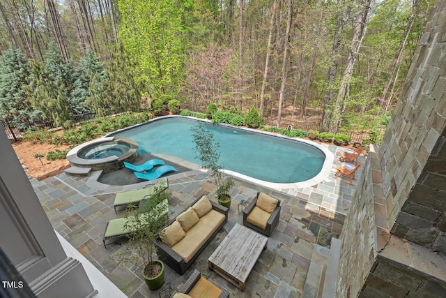 417 Westbury Dr, Chapel Hill, NC 27516 - view of pool featuring a patio area, a pool with connected hot tub, and a wooded view