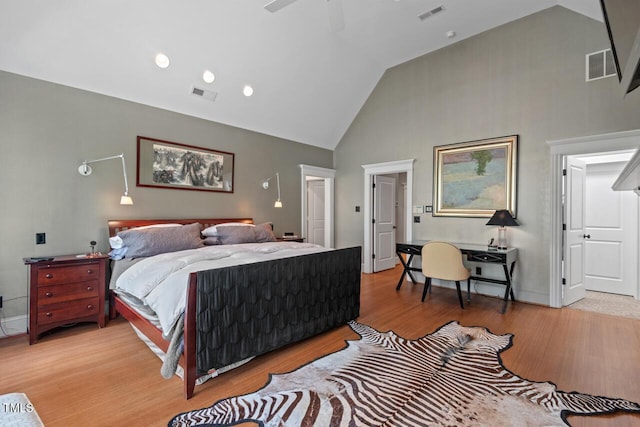 417 Westbury Dr, Chapel Hill, NC 27516 - bedroom with light wood-type flooring, high vaulted ceiling, and visible vents