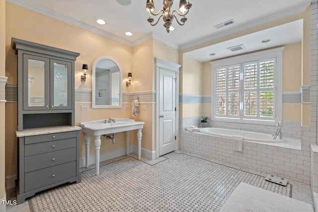 417 Westbury Dr, Chapel Hill, NC 27516 - full bathroom featuring a chandelier, a garden tub, ornamental molding, and visible vents