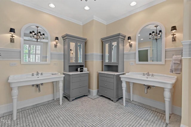 417 Westbury Dr, Chapel Hill, NC 27516 - bathroom with ornamental molding, a wainscoted wall, and a chandelier