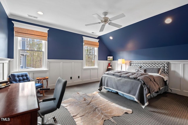 417 Westbury Dr, Chapel Hill, NC 27516 - carpeted bedroom with ceiling fan, ornamental molding, vaulted ceiling, visible vents, and wainscoting