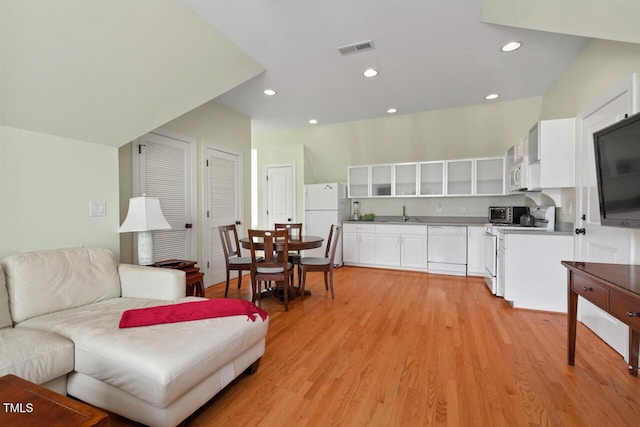 417 Westbury Dr, Chapel Hill, NC 27516 - living room featuring light wood-style flooring, visible vents, and recessed lighting