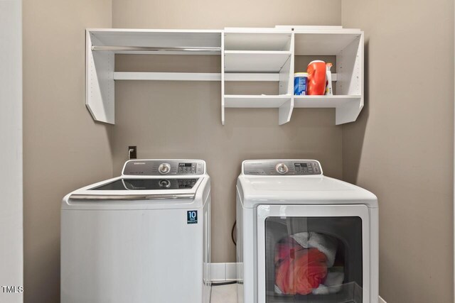 417 Westbury Dr, Chapel Hill, NC 27516 - laundry room with washing machine and dryer and laundry area