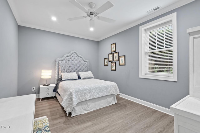 417 Westbury Dr, Chapel Hill, NC 27516 - bedroom featuring crown molding, visible vents, baseboards, and wood finished floors