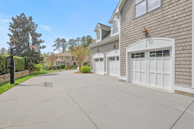 417 Westbury Dr, Chapel Hill, NC 27516 - view of side of home with driveway and an attached garage