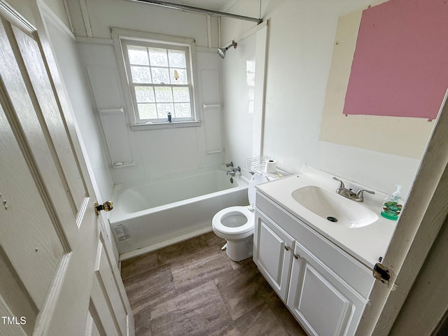 full bath with visible vents, toilet, wood finished floors, vanity, and shower / tub combination