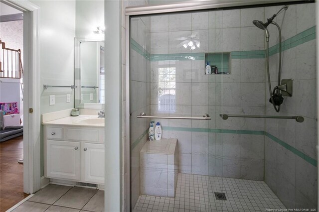 6826 Surrey Rd, Fayetteville, NC 28306 - full bath with vanity, tile patterned floors, and a shower stall