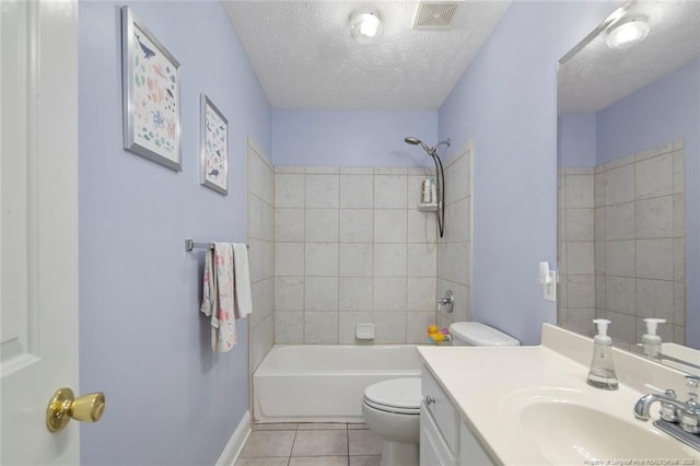 6826 Surrey Rd, Fayetteville, NC 28306 - full bath with vanity, toilet, a textured ceiling, tile patterned floors, and visible vents