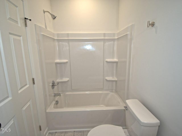 bathroom with toilet, shower / bathing tub combination, and tile patterned flooring