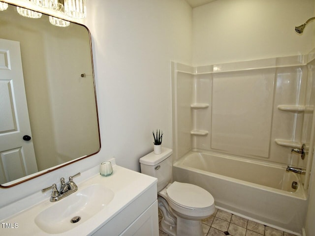 full bath with toilet, tile patterned floors, vanity, and tub / shower combination