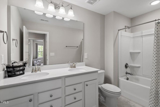 bathroom with visible vents, a sink, and toilet