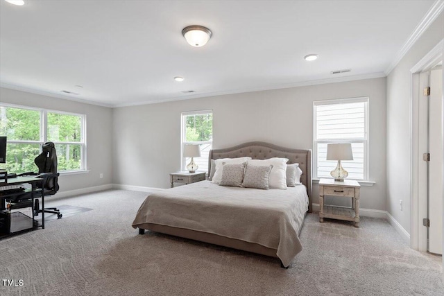 carpeted bedroom featuring baseboards, ornamental molding, recessed lighting, and visible vents