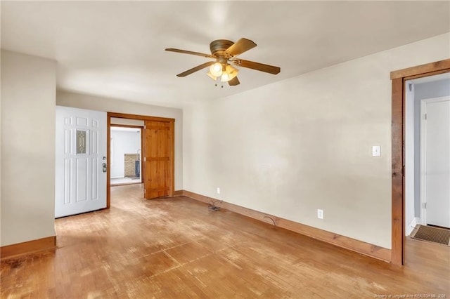 5213 Palmetto Ln, Fayetteville, NC 28304 - spare room with baseboards, a ceiling fan, and wood finished floors