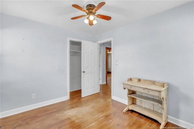 5213 Palmetto Ln, Fayetteville, NC 28304 - bedroom with a closet, ceiling fan, baseboards, and wood finished floors