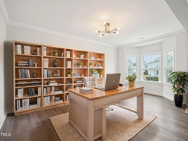 office area with a chandelier, dark wood finished floors, baseboards, ornamental molding, and visible vents
