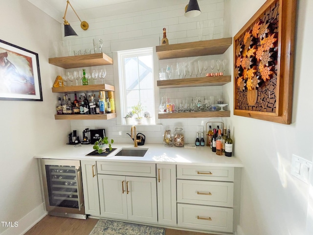 14 Duck Bill Trl, Pittsboro, NC 27312 - indoor wet bar with wine cooler, backsplash, wood finished floors, and baseboards