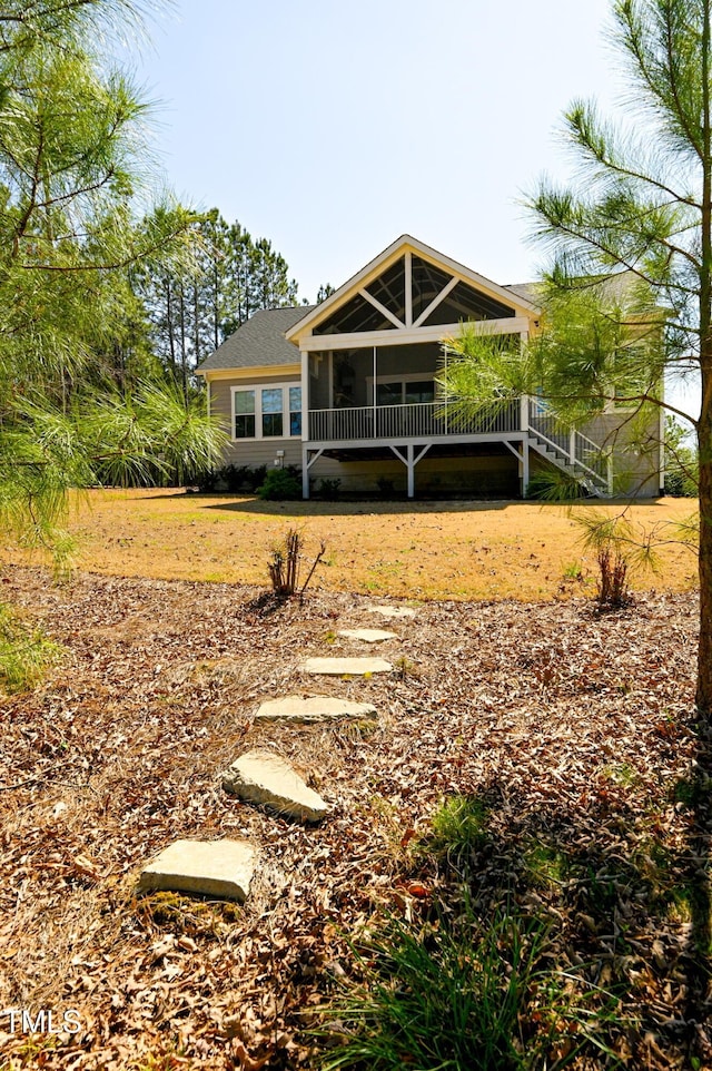 14 Duck Bill Trl, Pittsboro, NC 27312 - rear view of property with a sunroom